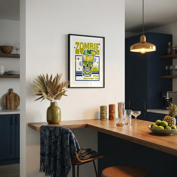 Modern kitchen with a framed poster on the wall, wooden counter, and decorative items.