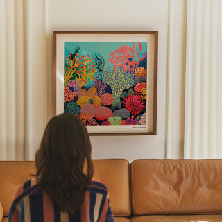 Richly colored tropical sea wall art featuring orange coral branches and dotted sea sponges.