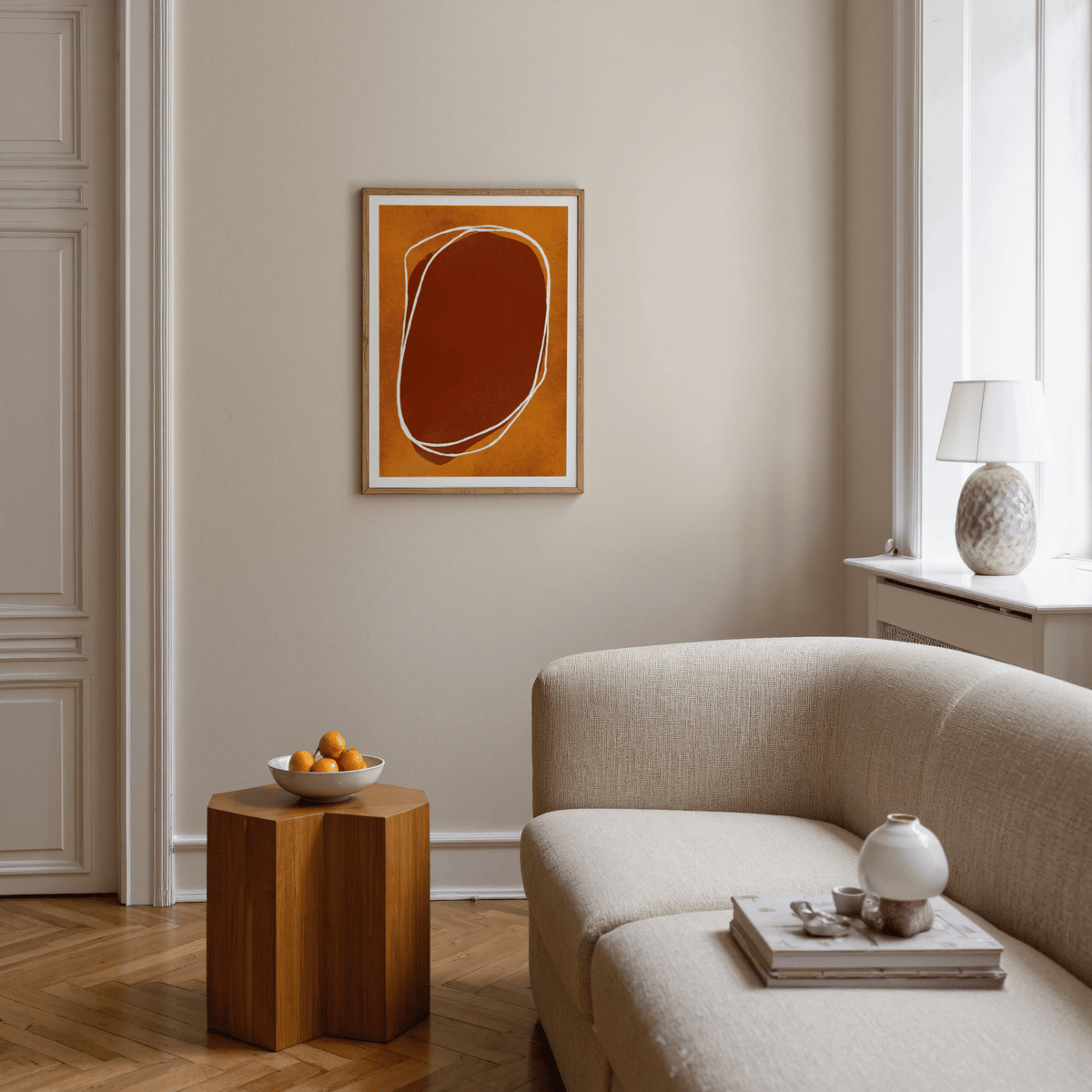 Living room mock-up of Abstract Earth Tone Wall Art in slim frame above sofa