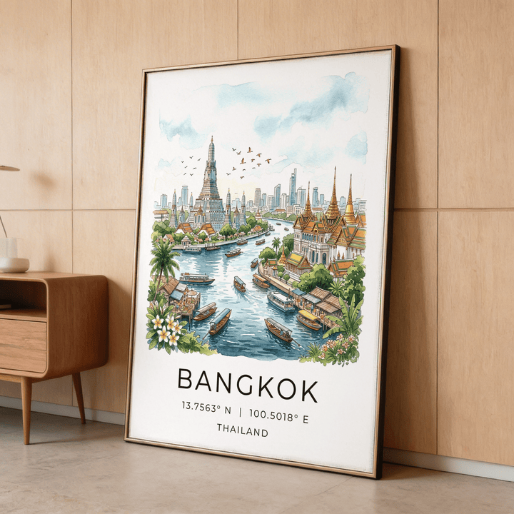 Framed Bangkok City Art Print leaning against a wood paneled wall with a wooden cabinet nearby