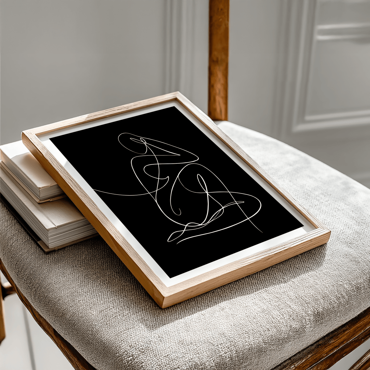 Single-line seated figure illustration poster, black base and white outline