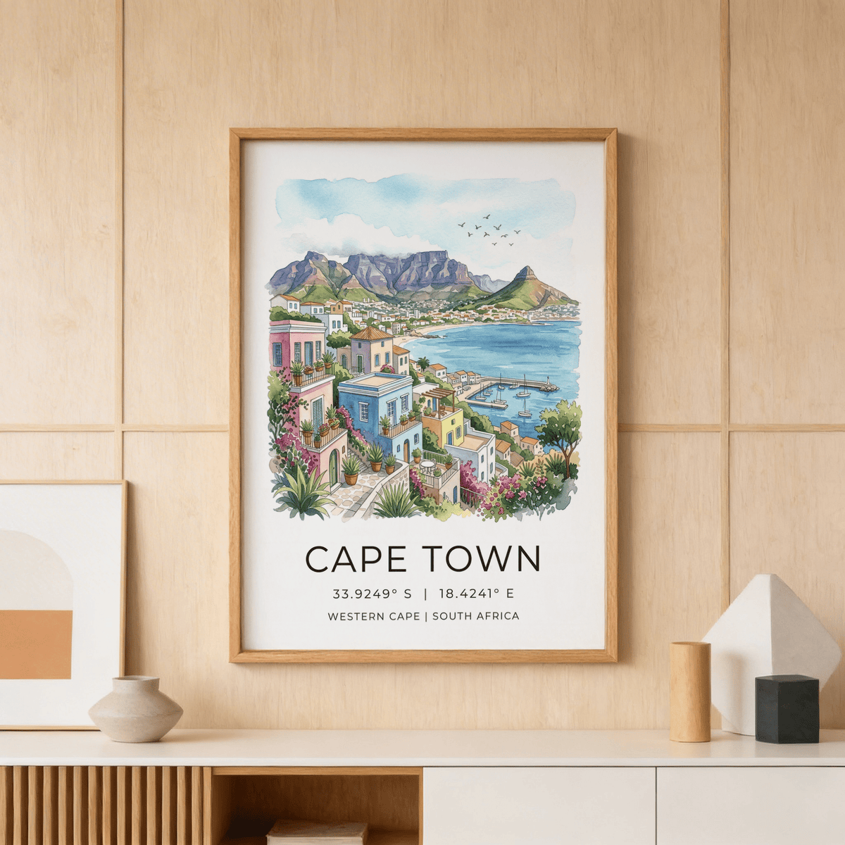 Illustrated Cape Town wall art poster showing colorful hillside buildings and coastal harbor
