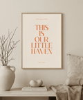 Typography Art Print with “This Is Our Little Haven” quote in orange serif letters on beige background