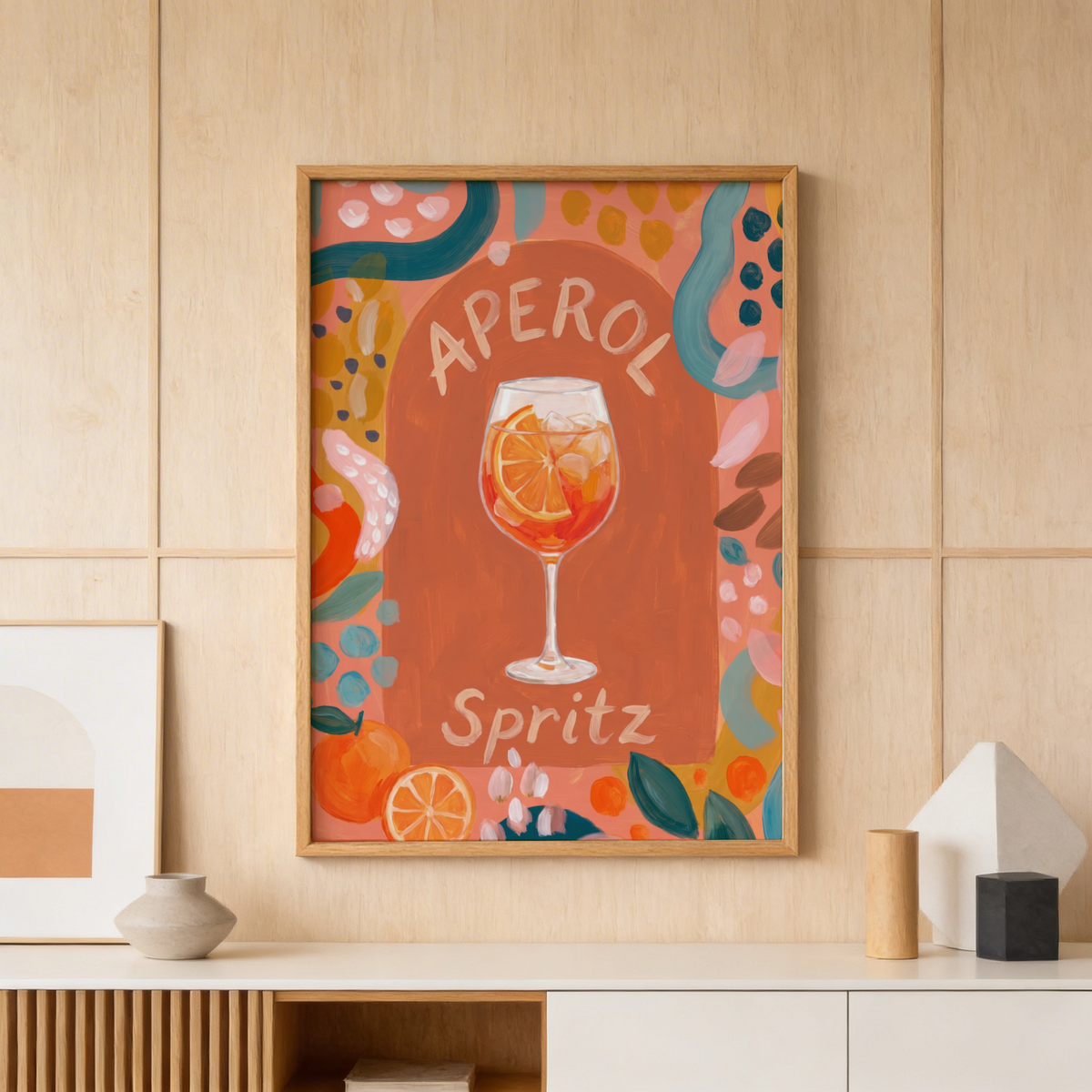 Showcasing painted cocktail poster with stemmed glass, ice cubes, and orange wheel