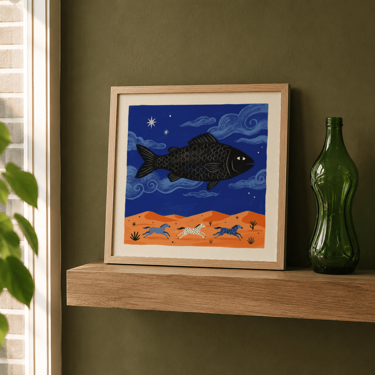 Desert scene wall art print with three running horses beneath a giant fish