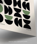 Graphic art gallery print with black circular and semi-circular forms.