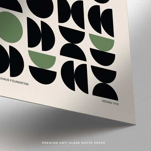 Graphic art gallery print with black circular and semi-circular forms.
