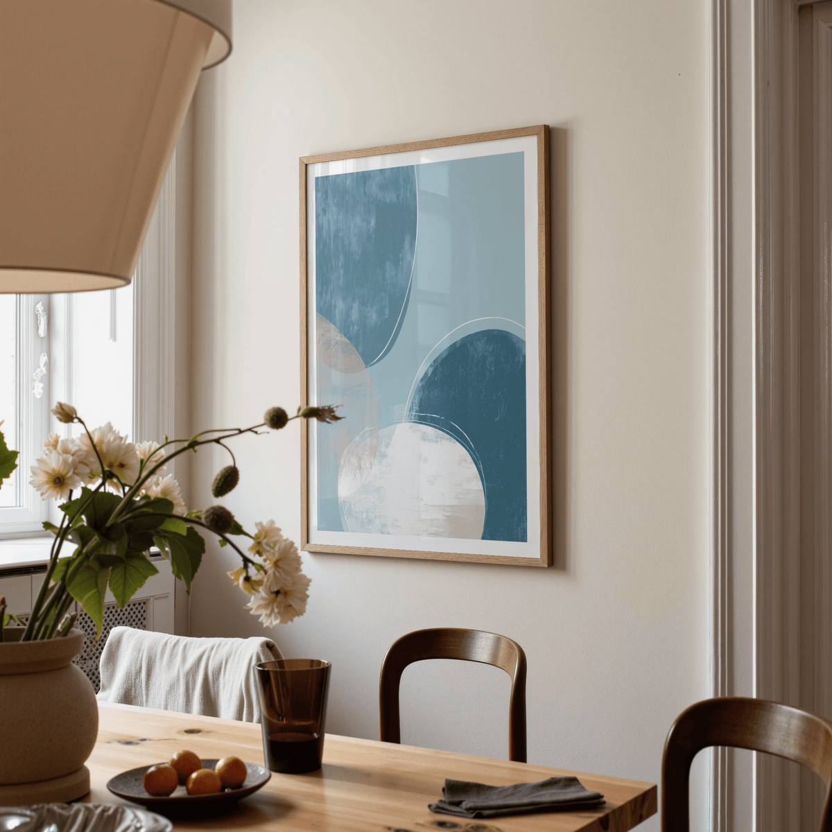Balanced abstract print wall art with rounded forms and lightly distressed texture