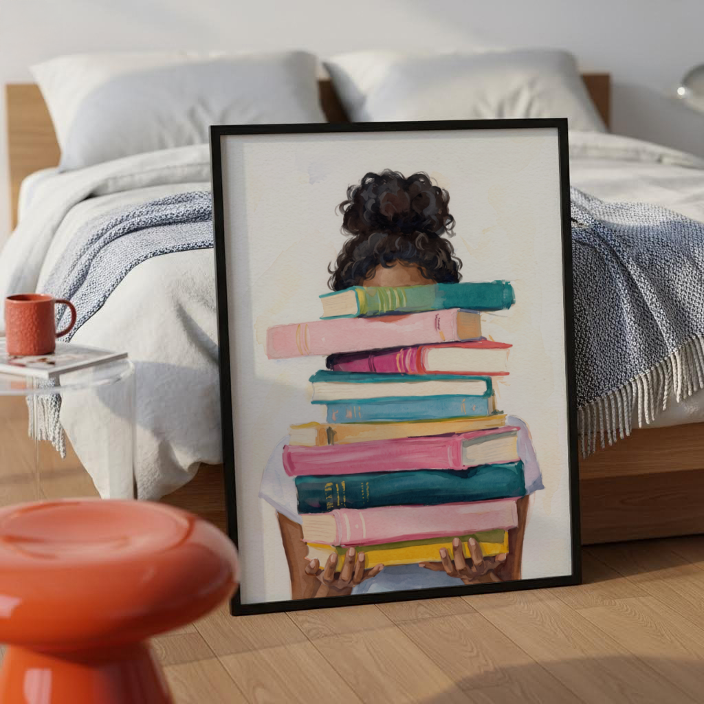 Centered watercolor wall art print of stacked books held by hands with curly hair visible above the top book