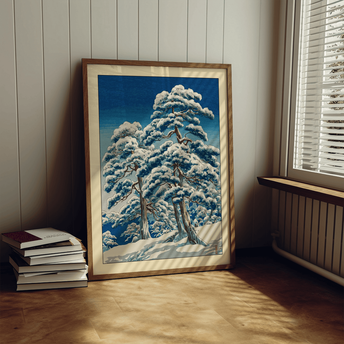 Vertical wall art print of pine trunks and drifting snow with open sky space