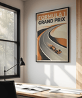 Angled view of motorsport wall art print showing sweeping racetrack curves and open-wheel car