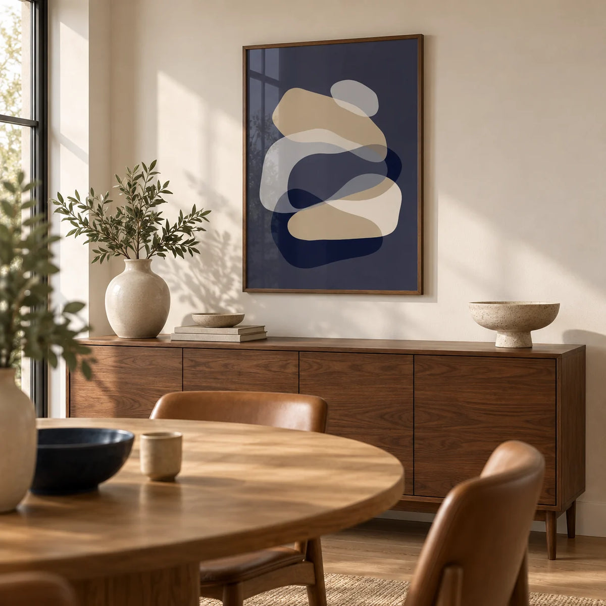 Abstract Art Shapes, framed on the wall of a modern dining room with a warm white wall