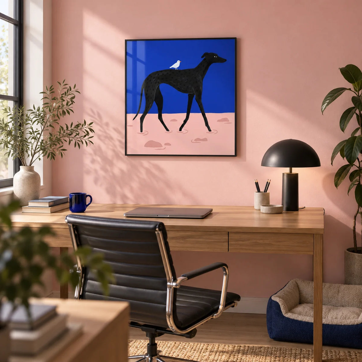 Abstract Black Dog Poster, framed on the wall of a modern home office with a soft pink painted wall
