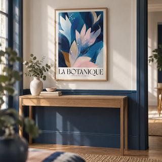 Abstract Botanical Art Print, framed on the wall of a hallway with a plain navy lower wall and white upper wall