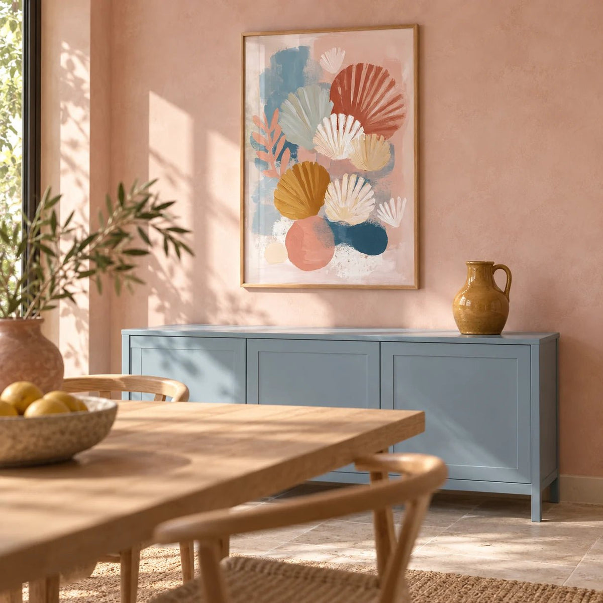 Abstract Botanical Print, framed on the wall of a sunny dining room with warm blush limewashed walls and a pale stone floor