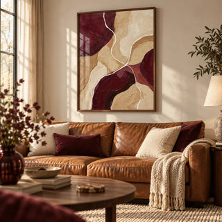 Burgundy Abstract Art, framed on the wall of a warm living room