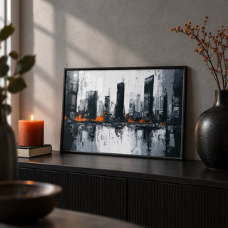 Abstract City Wall Art, a small A4 framed print leaning on a black sideboard in a living room
