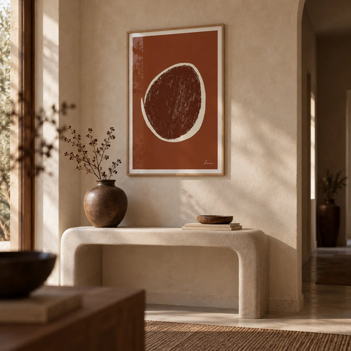 Abstract Earth Tone Art Print, framed on the wall of a calm hallway with a sand plaster wall