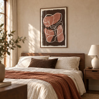 Abstract Earth Tone Print, framed on the wall of a calm contemporary bedroom with a pale clay plaster wall