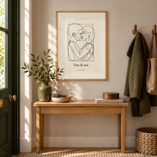 Abstract Figures in a welcoming hallway, natural wood frame