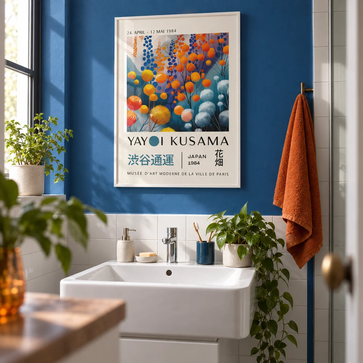 Abstract Floral Wall Art, framed on the wall of a fresh bathroom with a cobalt blue painted wall and plain white tiles