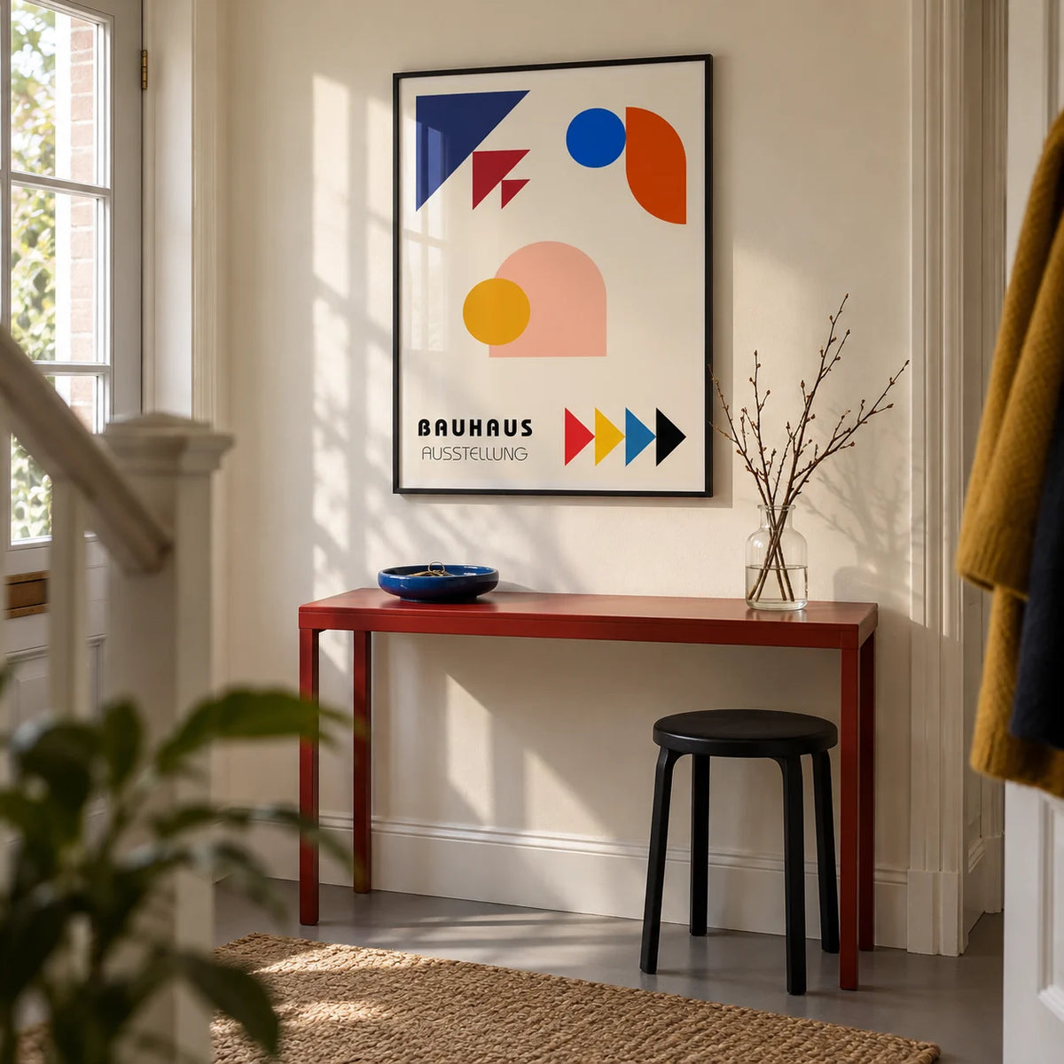 Abstract Geometric Art, framed on the wall of a modern entrance hallway in a UK maisonette with cream walls and a plain grey floor