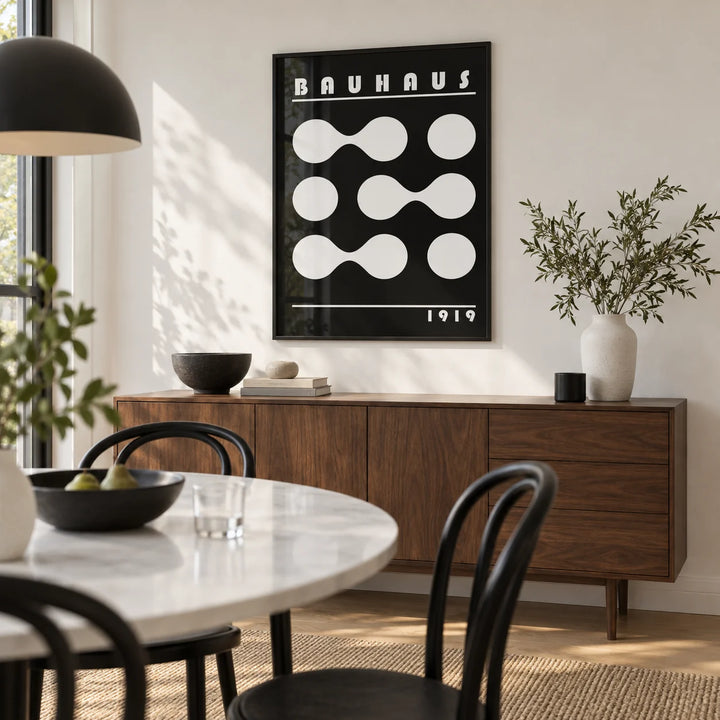 Abstract Geometric Print, framed on the wall of a modern dining room with a white wall