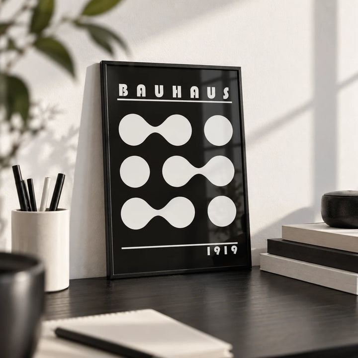 Abstract Geometric Print, a small A4 framed print leaning on a black desk