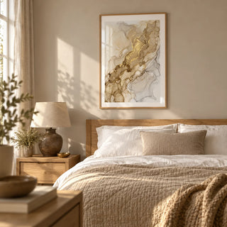 Abstract Gold Art Print, framed on the wall of a restful grown-up bedroom with a pale taupe wall and natural oak furniture