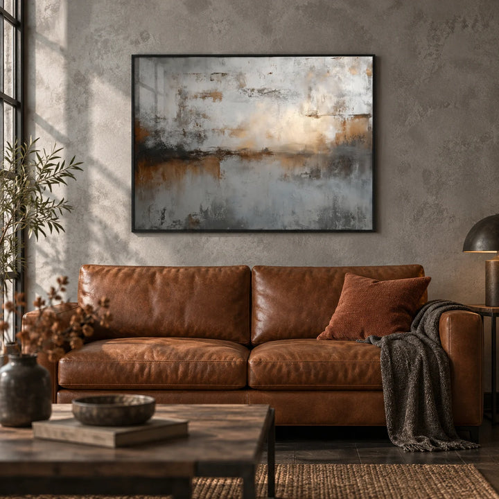Abstract Gray Art Print, framed on the wall of an industrial living room with a grey plaster wall and dark wood floor