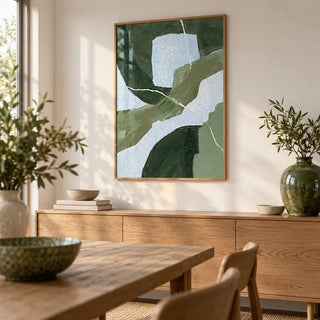 Abstract Green Wall Art, framed on the wall of a calm dining room with a warm white wall