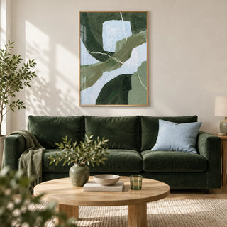 Abstract Green Wall Art, framed on the wall of a calm living room with a warm white wall and a light oak floor