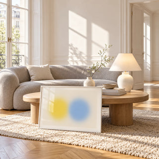 Abstract Minimal Print, framed and leaning against a coffee table in a bright living room