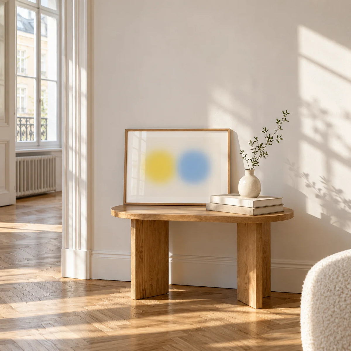 Abstract Minimal Print, a small A4 framed print leaning on a small solid oak side table