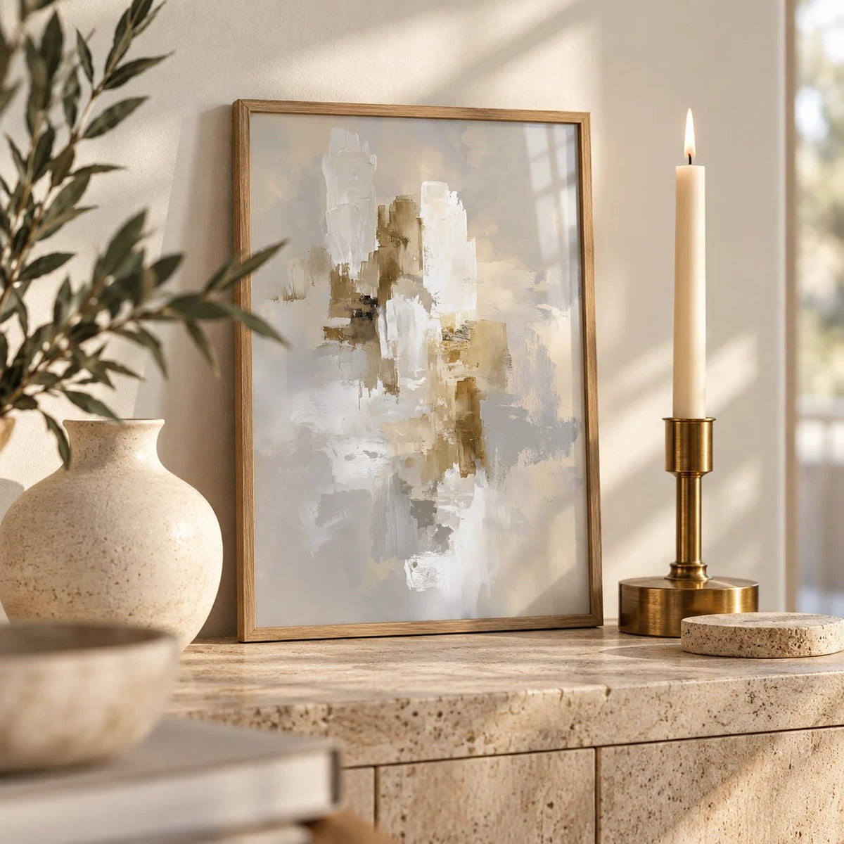 Abstract Neutral Art Print, a small A4 framed print leaning on a travertine side table in a hallway