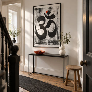 Abstract Om Art Print, framed on the wall of a design-led hallway in a Victorian UK terrace with white walls and restored timber flooring