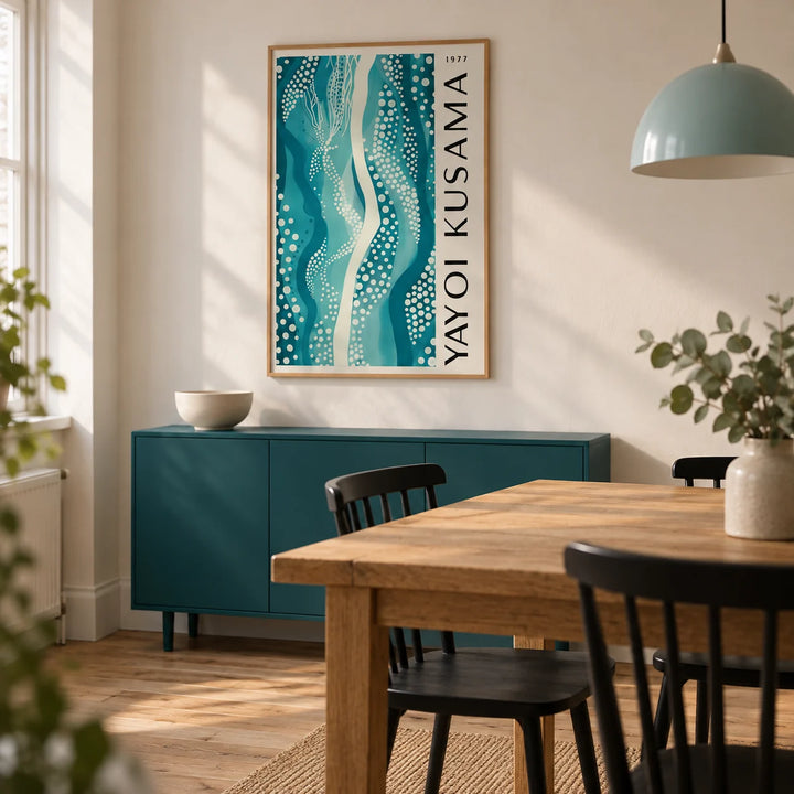 Abstract Picture, framed on the wall of a modern dining room in a UK terrace with an off-white wall and an oak dining table with plain black chairs