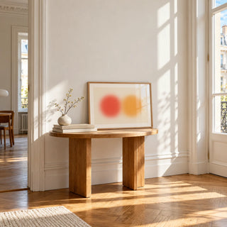 Abstract Sun Wall Art, a small A4 framed print leaning on a small solid oak side table