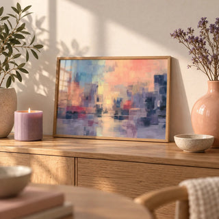 Abstract Sunset Art Print, a small A4 framed print leaning on an oak sideboard in a living room