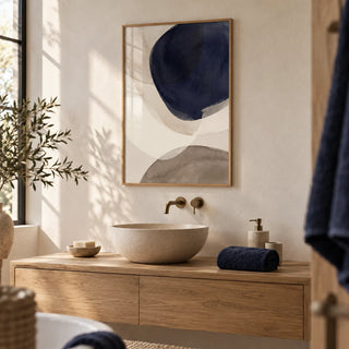 Abstract Watercolor Print, framed on the wall of a calm bathroom with a warm white plaster wall