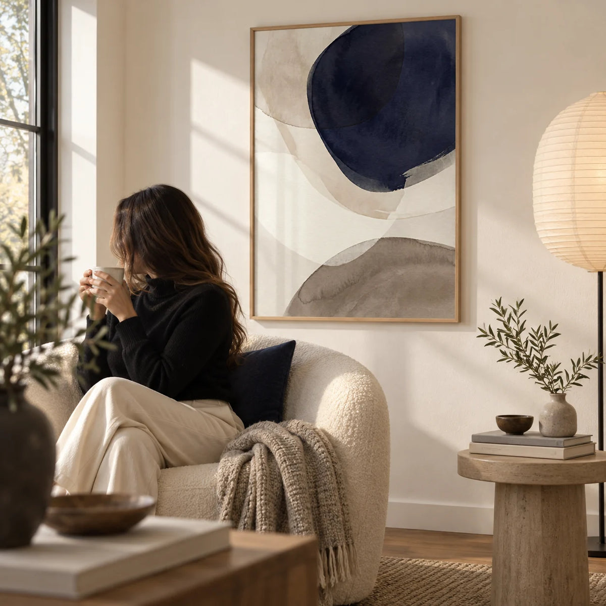 Abstract Watercolor Print, framed on the wall of a quiet reading corner with a warm white wall in a living room