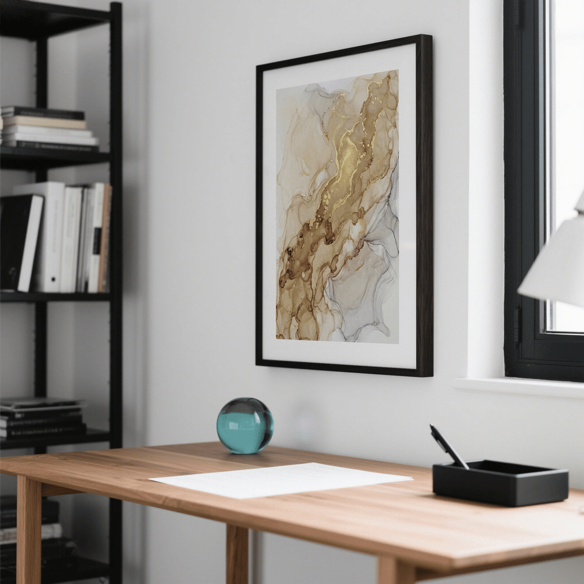 Wall display of liquid gold ink artwork above a console