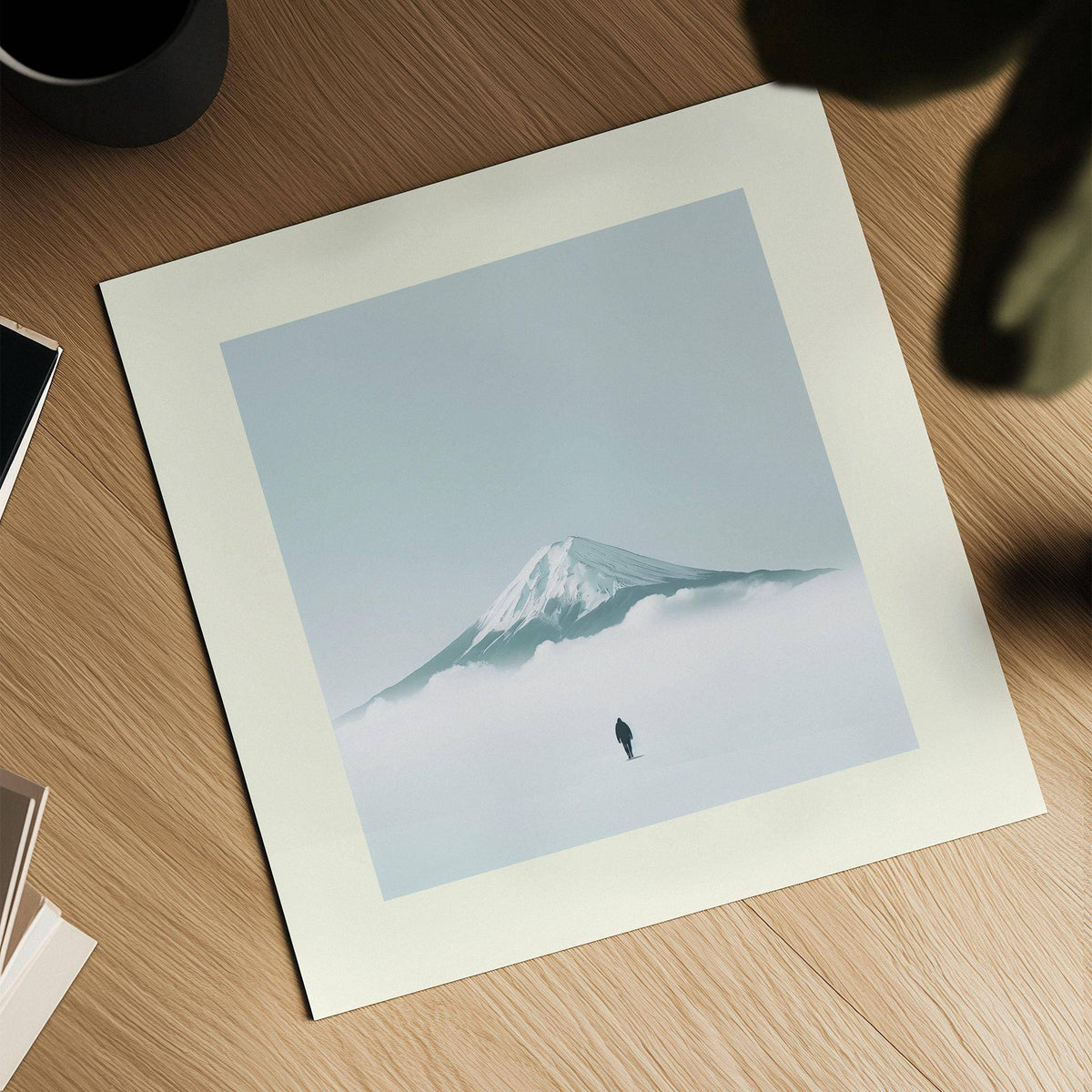 Japan Travel Poster of snowy Mount Fuji and a lone figure on a wooden table