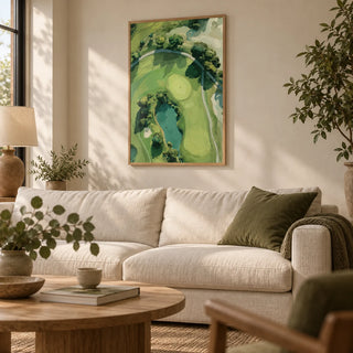 Aerial Golf Landscape Poster, framed on the wall of a calm living room