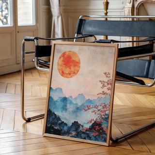 Wabi sabi Japanese Mountain Art showing a red sun rising over hazy hills.