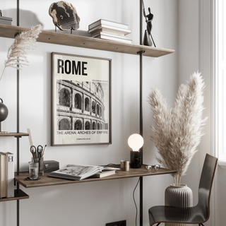 Typography-led Colosseum Wall Art featuring black-and-white amphitheater arches and 'The Arena: Arches of Empire' caption