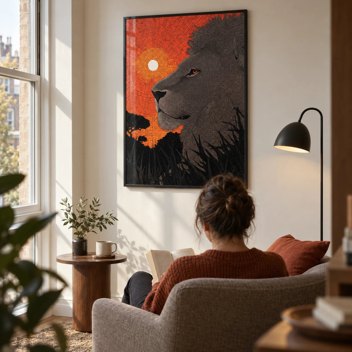 African Landscape Wall Art, framed on the wall of a warm reading corner in a UK flat with an off-white wall and a tall window to one side in a living room