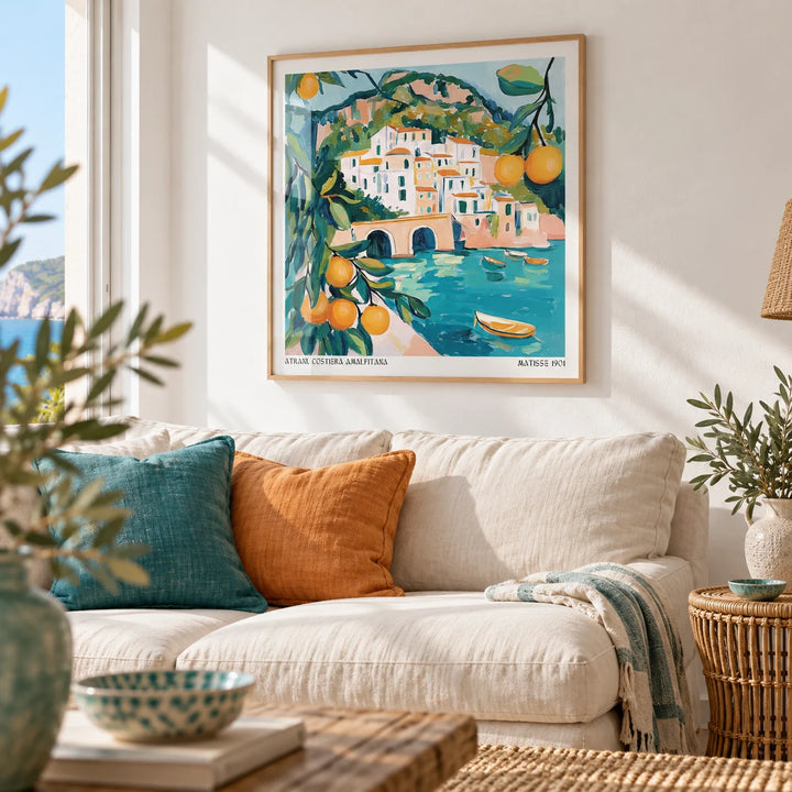 Amalfi Coast Painting, framed on the wall of a bright coastal living room with a white wall