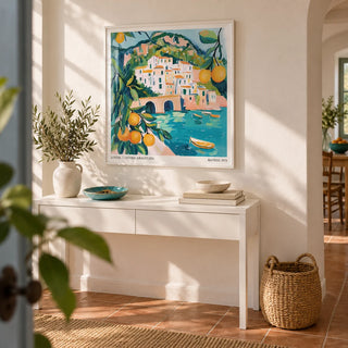 Amalfi Coast Painting, framed on the wall of a bright hallway with a warm white wall and plain terracotta floor tiles