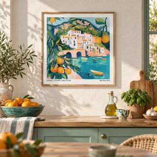 Amalfi Coast Painting, framed on the wall of a sunny Mediterranean-style kitchen with a warm white limewashed wall